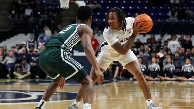 Penn State's Ace Baldwin Jr. moves the ball against Michigan State in a Big Ten basketball game at the Bryce Jordan Center.